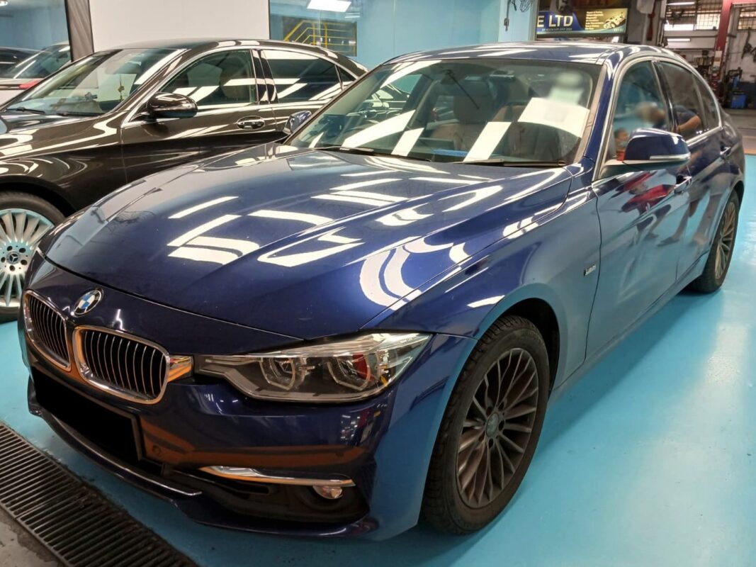 The BMW 318i as it arrived at Revol Carz before the respray.