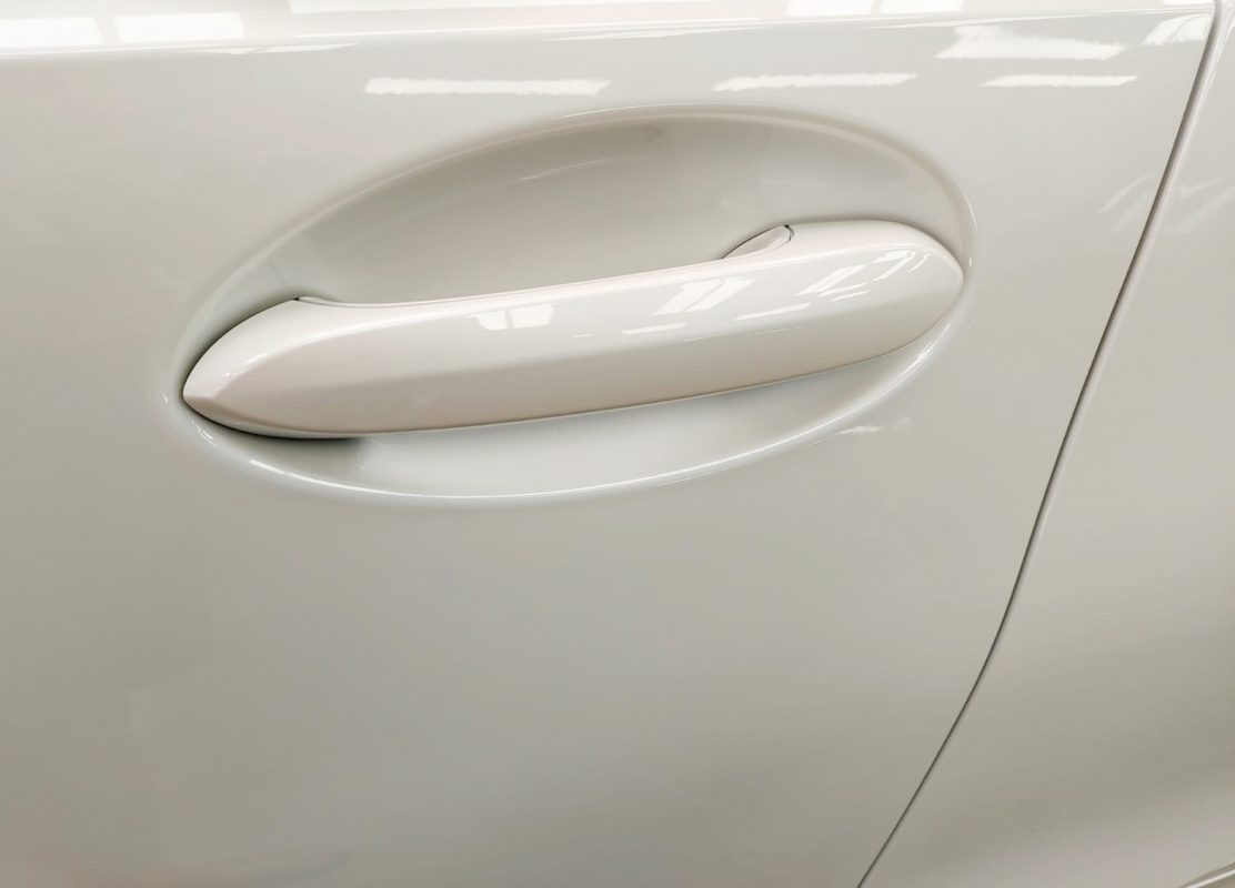 Front three-quarter view of the BMW 318i after coating.