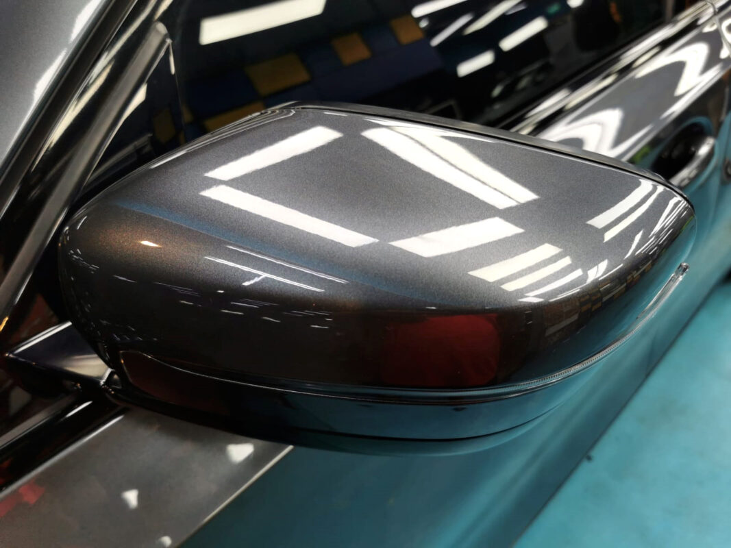 Before: the BMW 320i's bodywork at arrival, paintwork tired and blemished.