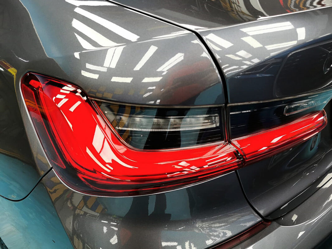 After: the same panels on the BMW 320i, resprayed to a fresh, even finish.