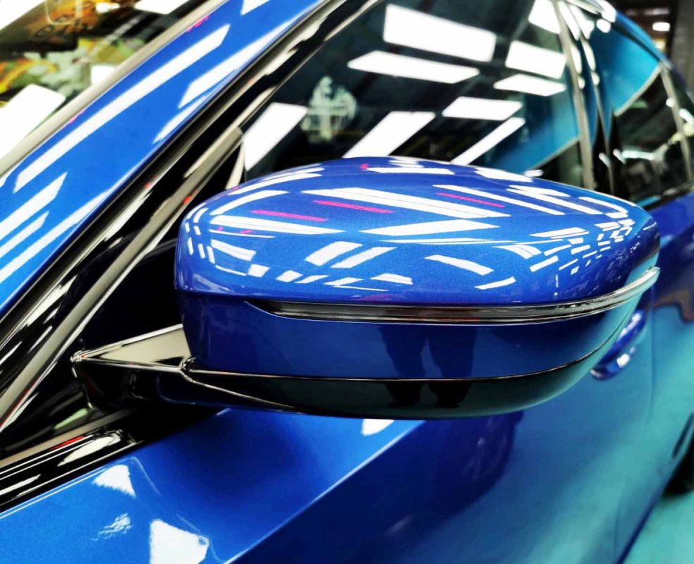 Side panel of the 320i with the titanium finish locked in.