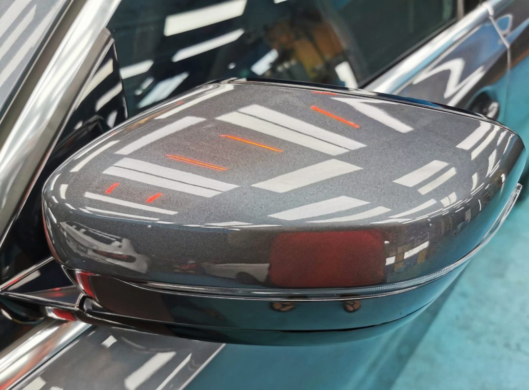 Side panel of the BMW 330i with the titanium finish locked in.