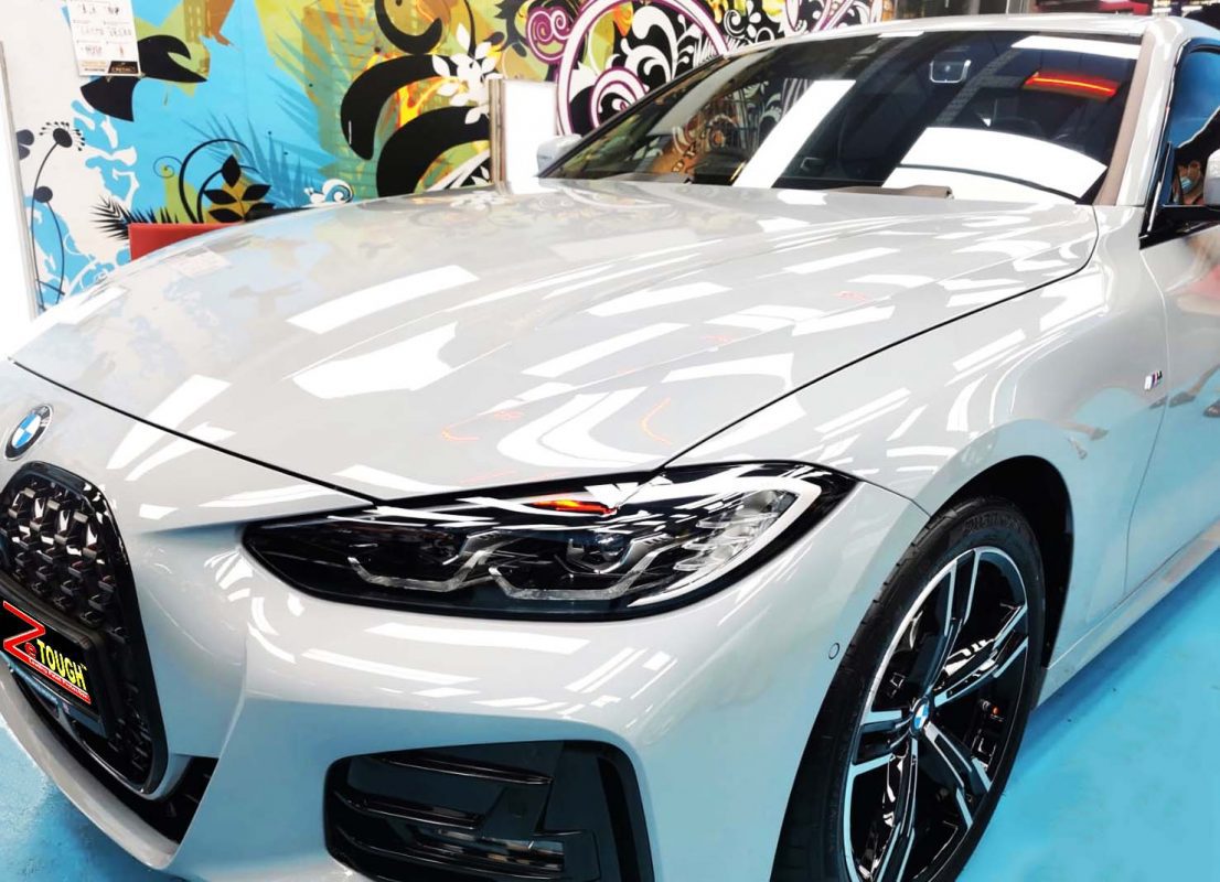 The BMW 4 Series from a side angle after the ceramic coating.