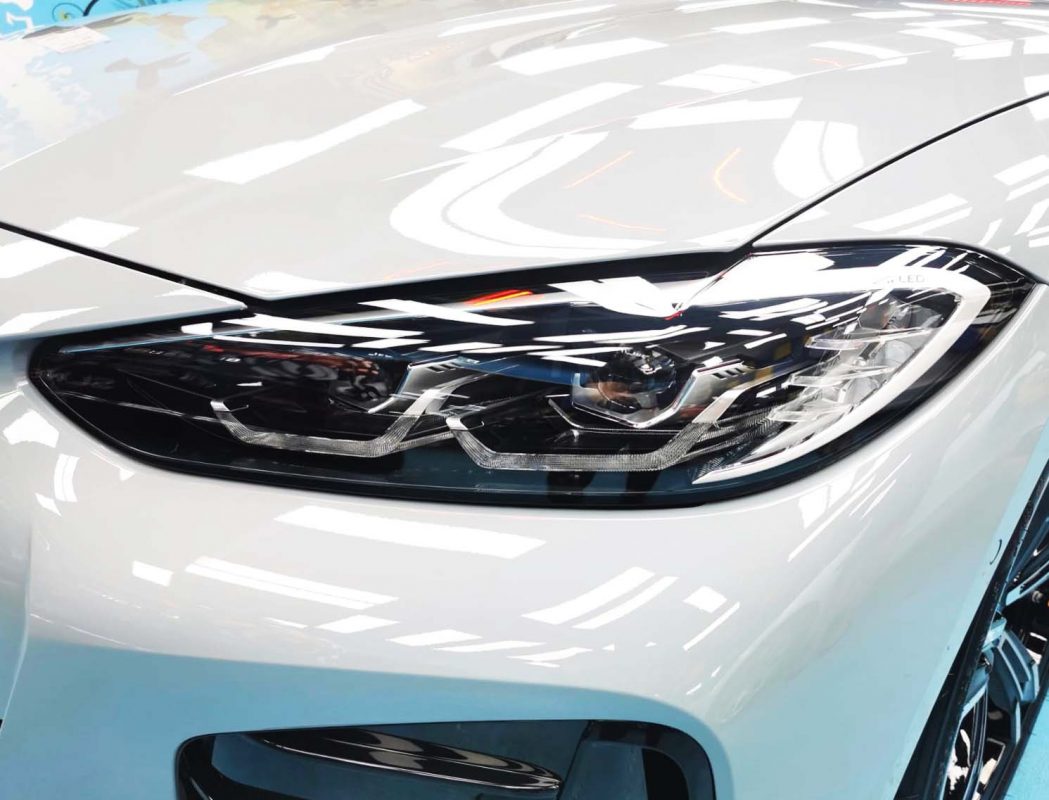 The 4 Series' coated paintwork showing clean reflections.