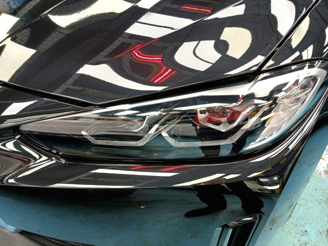 The BMW 4 Series' coated paintwork showing clean reflections.