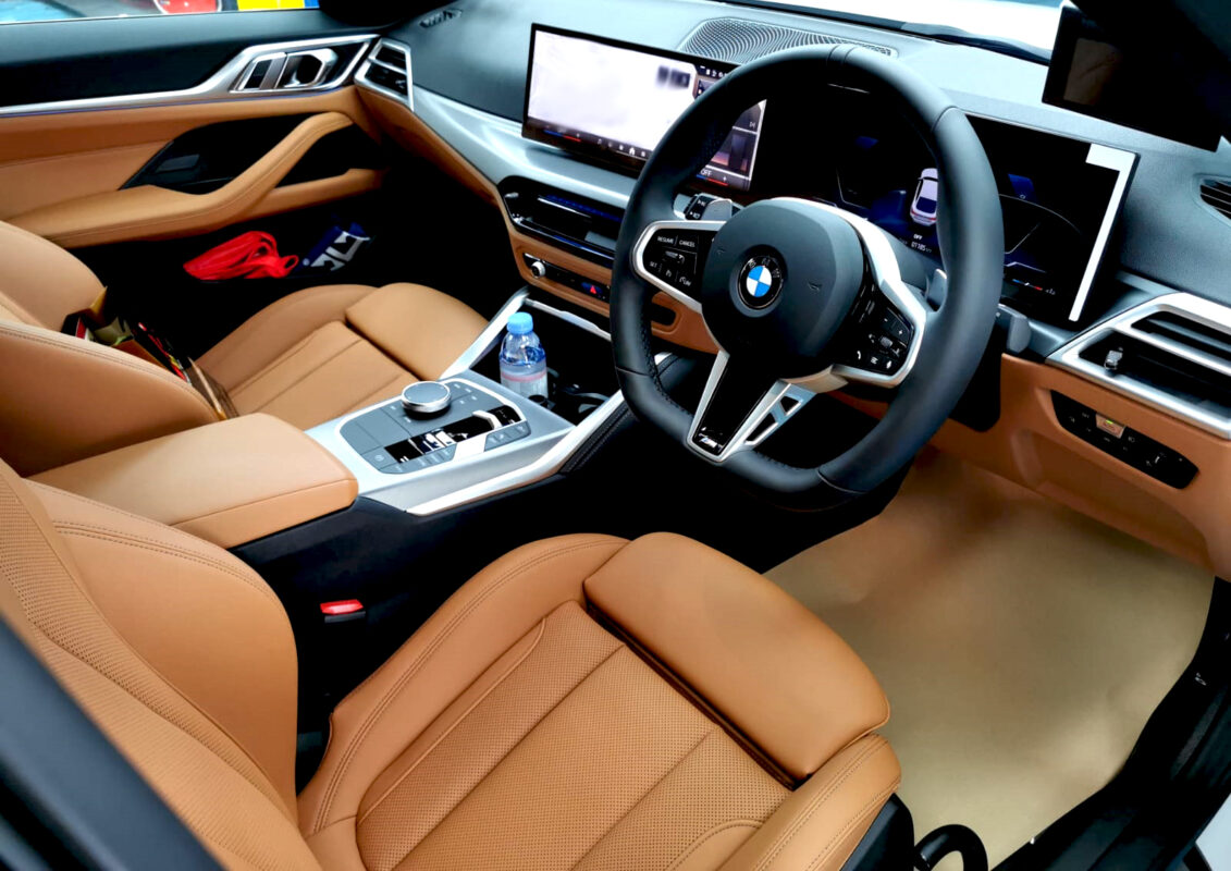 The BMW 4 Series parked in the workshop, freshly coated.