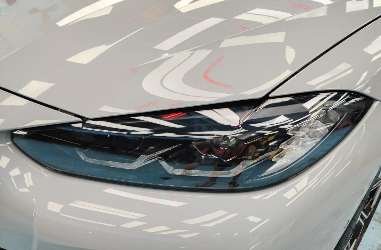 The 4 Series' coated paintwork showing clean reflections.