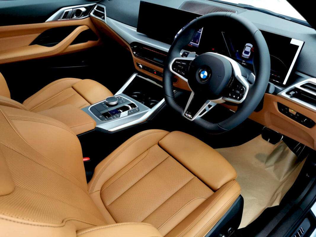 The BMW 4 Series parked in the workshop, freshly coated.