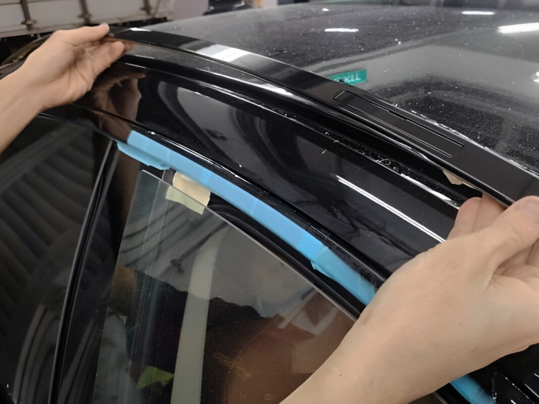 Polishing the new paint on the BMW 4 Series to bring up the shine.