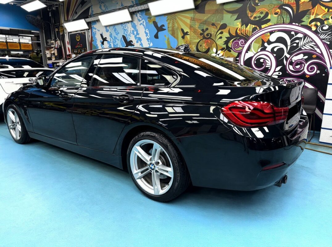 Glossy body panels on the resprayed BMW 4 Series.