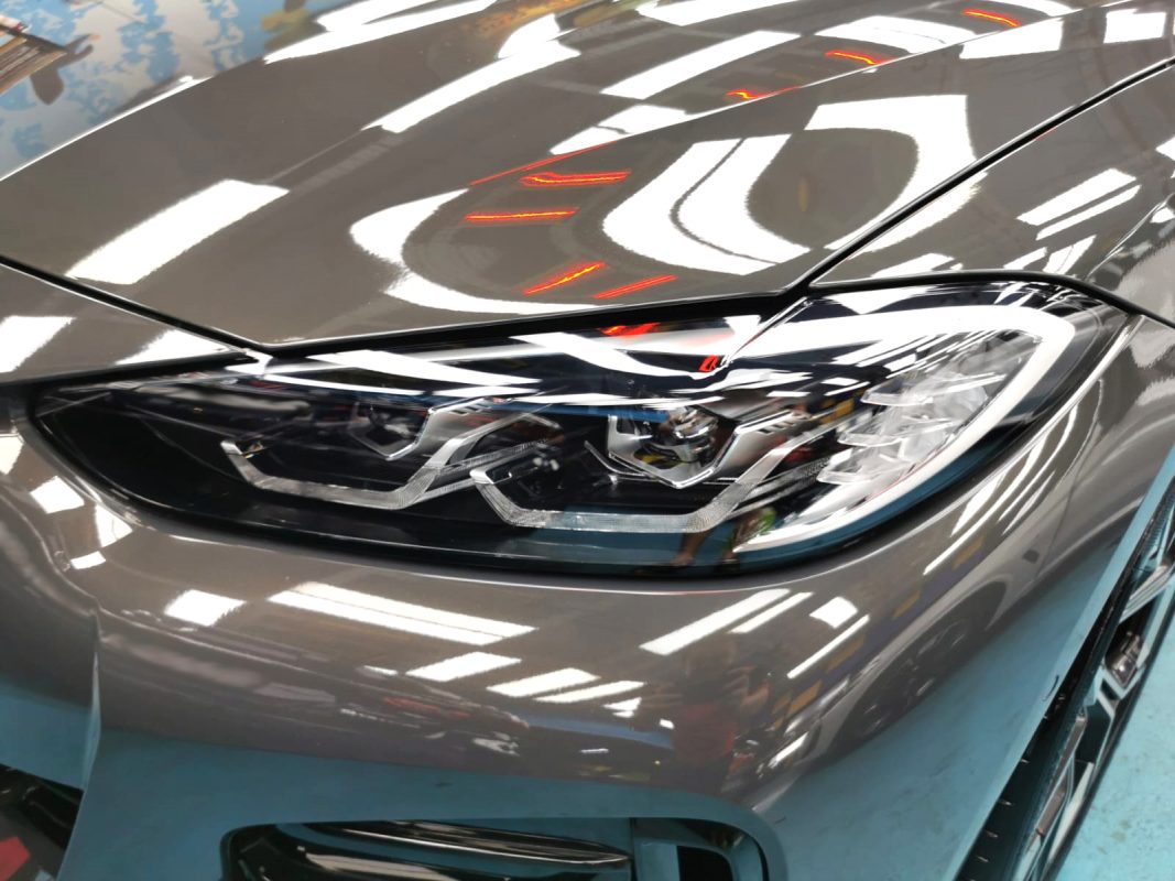 The 4 Series's coated paintwork showing clean reflections.