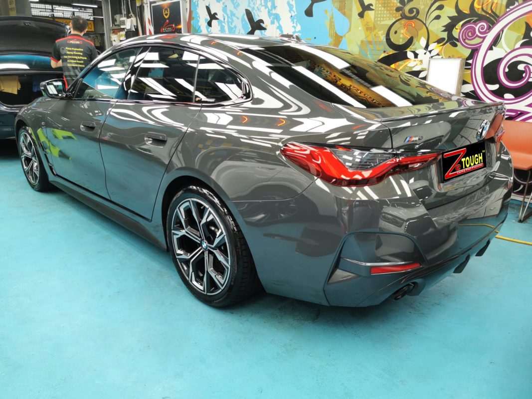 Rear quarter of the BMW 4 Series, glossy and protected.