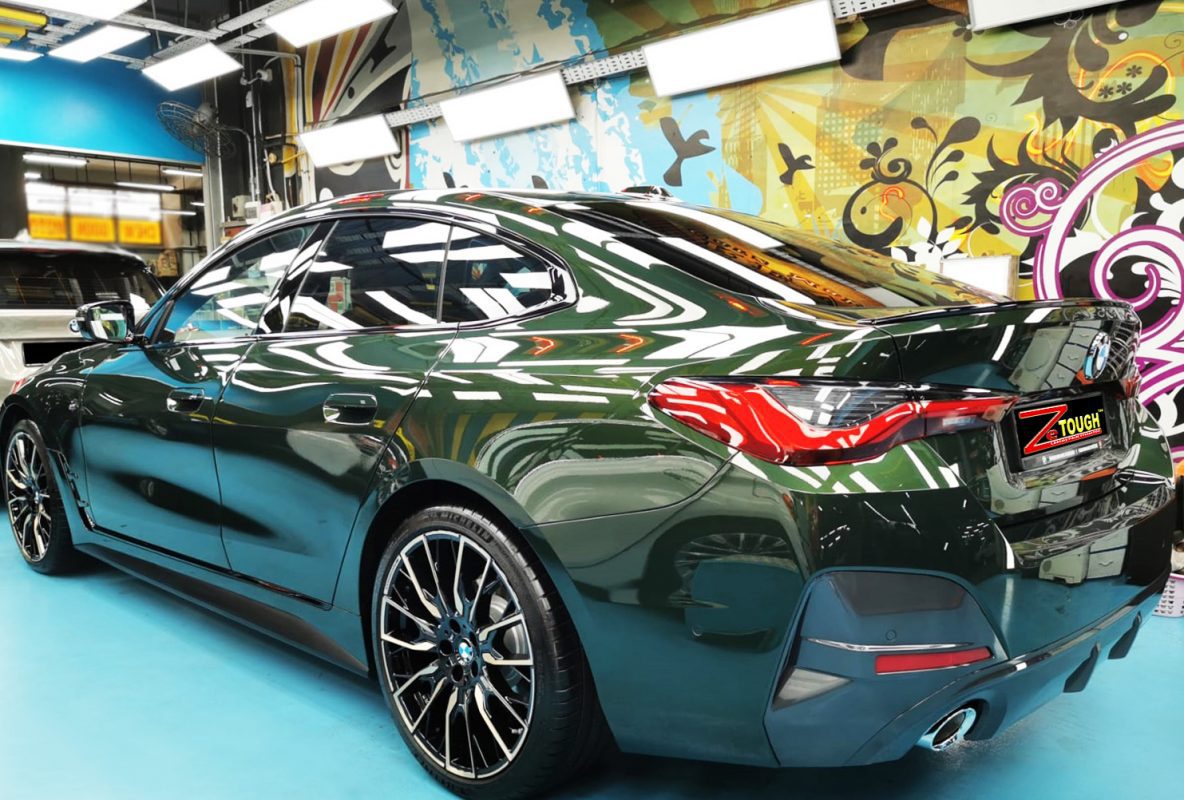 Rear quarter of the BMW 420i, glossy and protected.