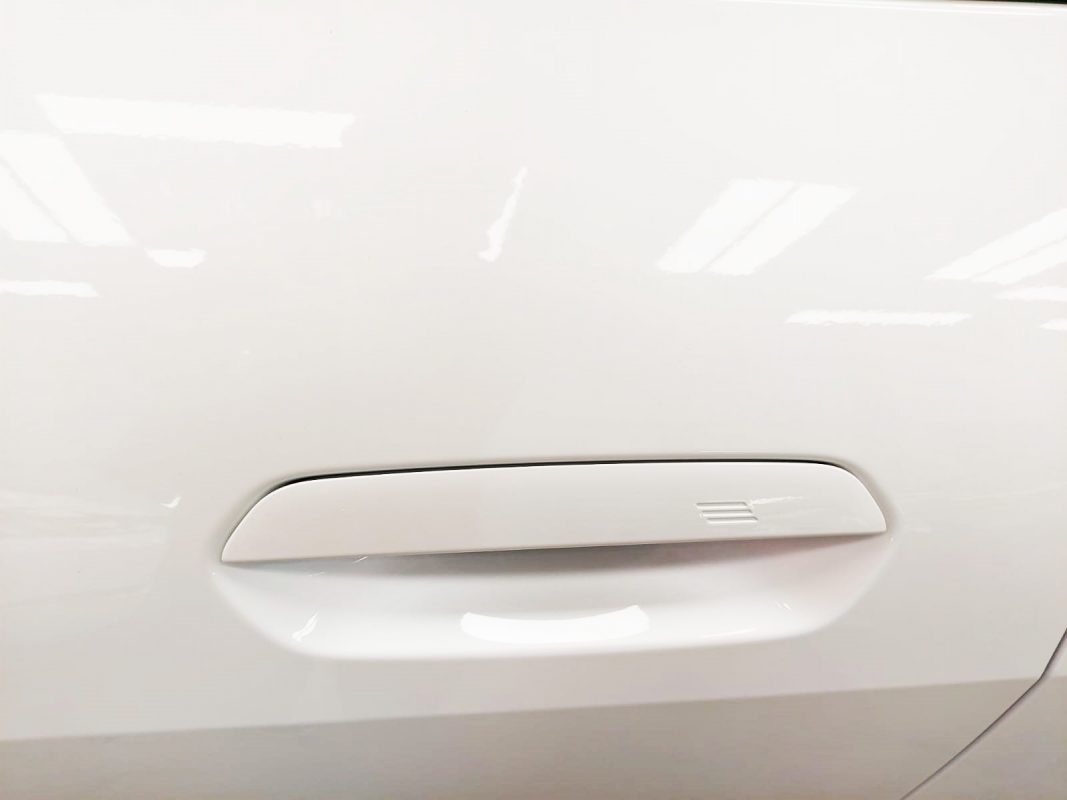 Front three-quarter view of the BMW 420i after coating.