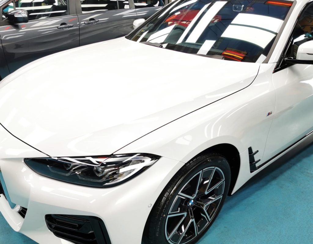 The BMW 420i from a side angle after the ceramic coating.
