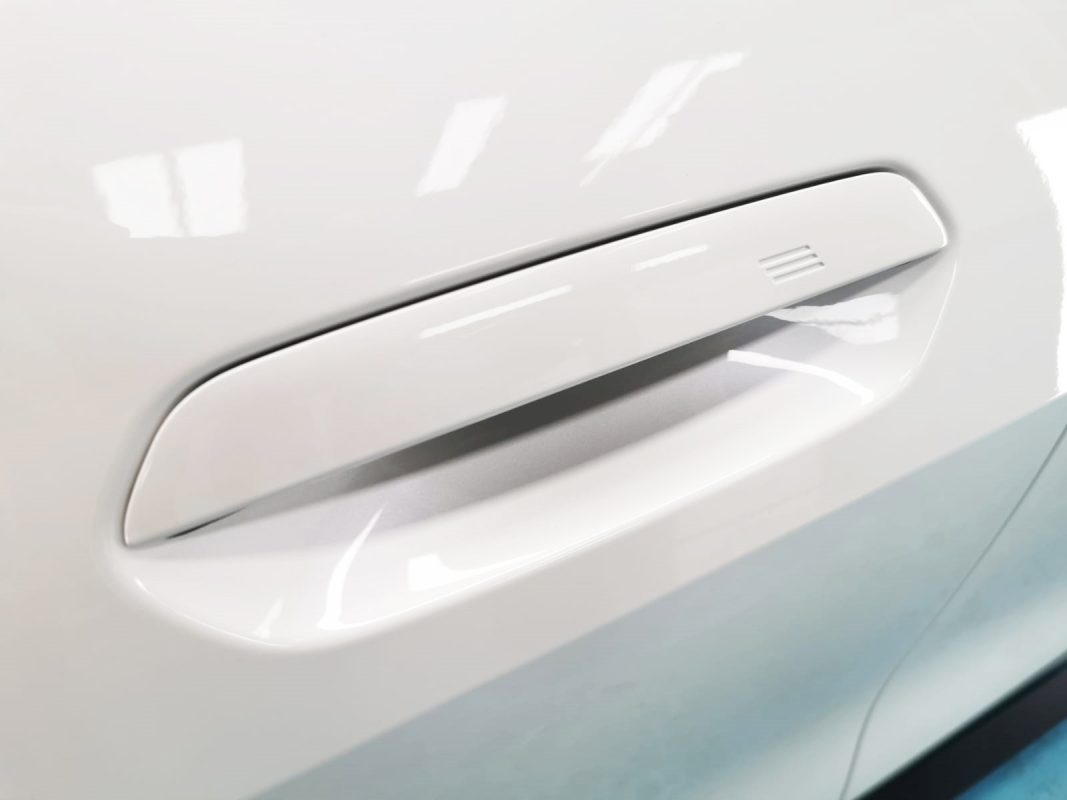 Front three-quarter view of the BMW 420i after coating.
