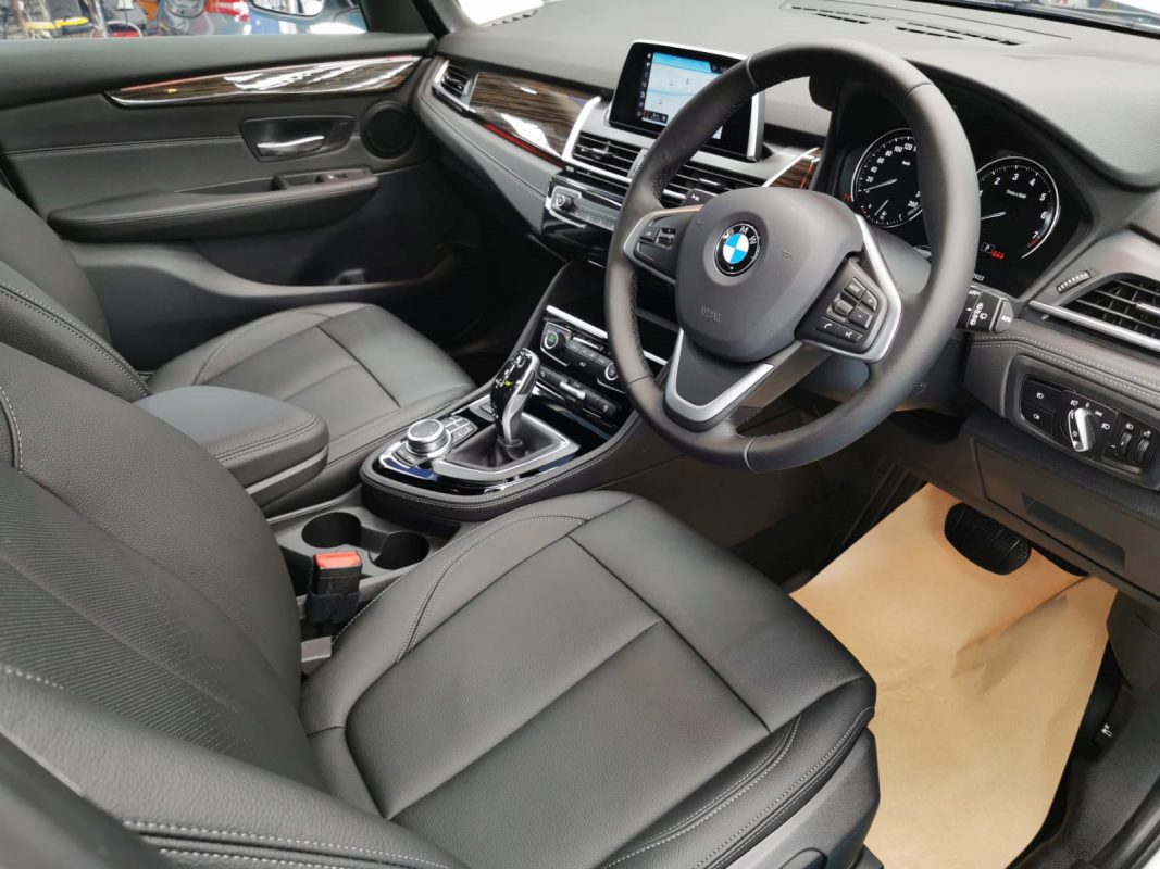 Front three-quarter view of the BMW 420i after coating.