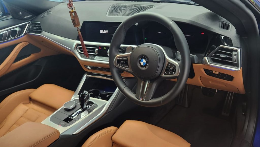 Front three-quarter view of the BMW 430i after coating.