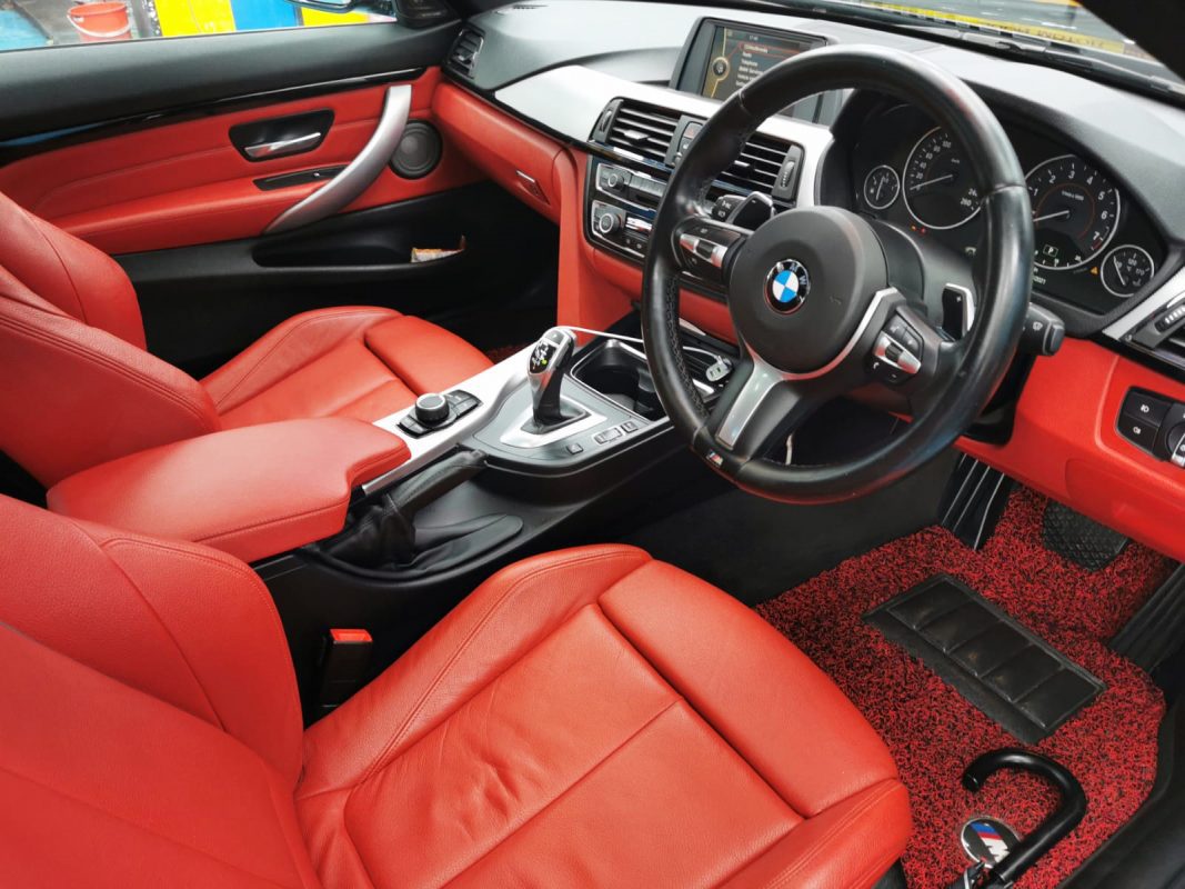 The BMW 435i Coupe parked in the workshop, freshly coated.