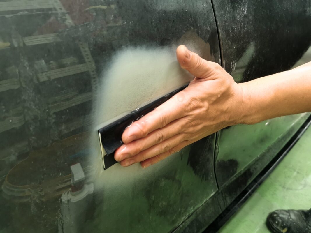 Primer applied to the BMW 435i panels after wet-sanding.