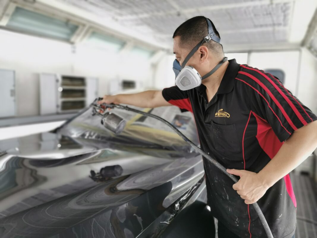The BMW 435i receiving its new paint coat in the spray booth on Day 6.
