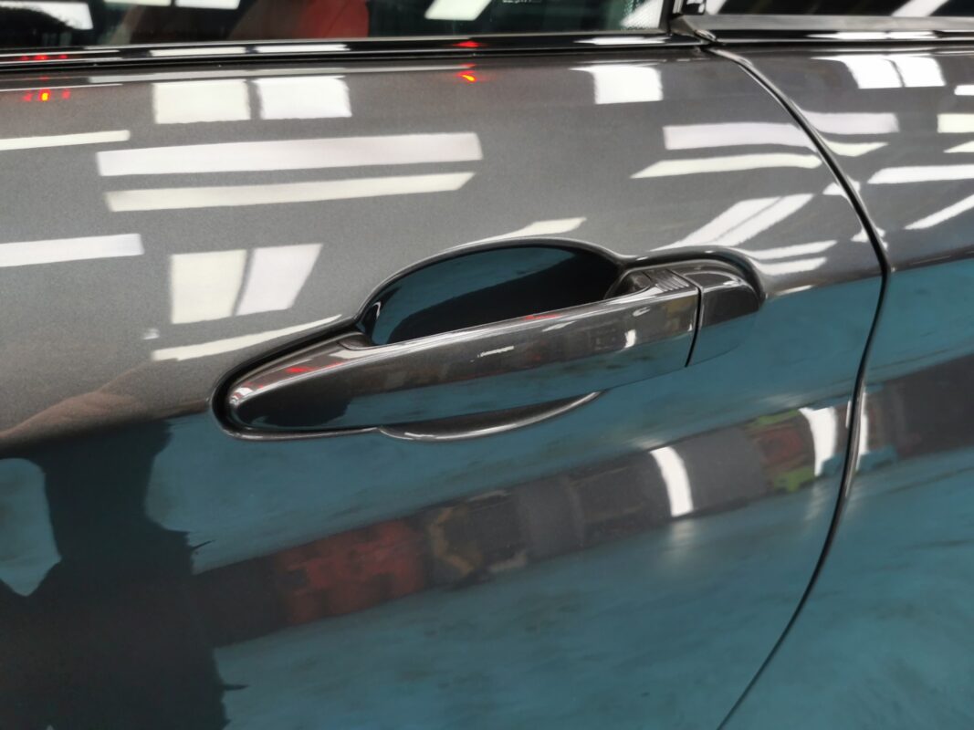 Before: the BMW 435i with its original faded and blemished paintwork.