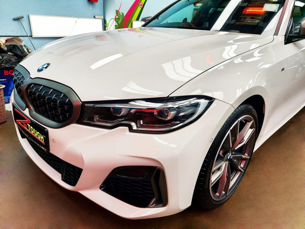The BMW 435i from a side angle after the ceramic coating.