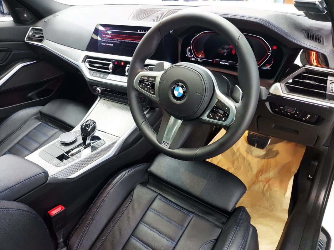 The BMW 435i parked in the workshop, freshly coated.