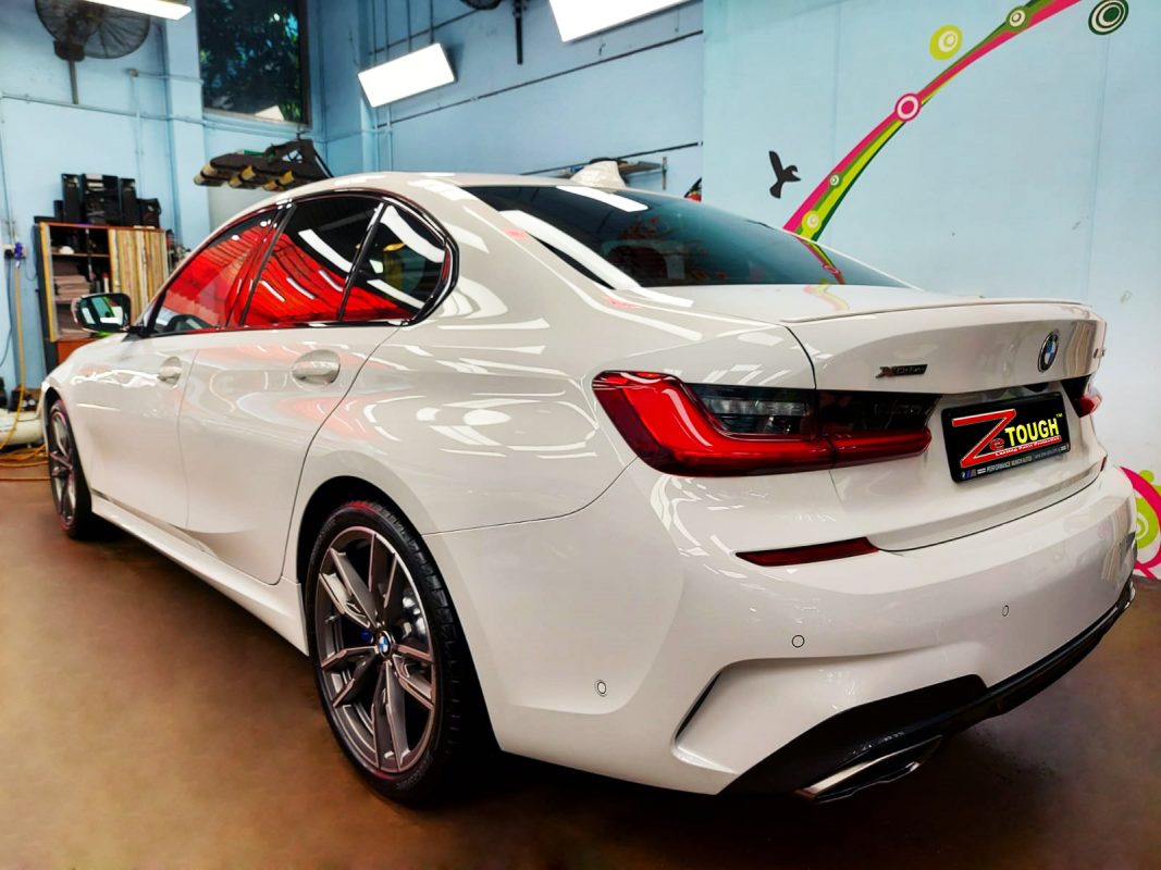 Rear quarter of the BMW 435i, glossy and protected.