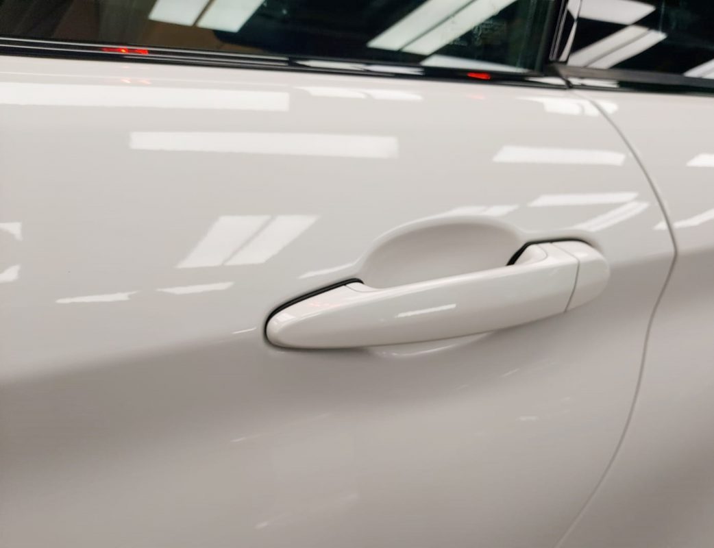 Front three-quarter view of the BMW 440i after coating.