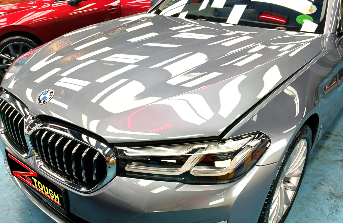 The BMW 5 Series from a side angle after the titanium coating.