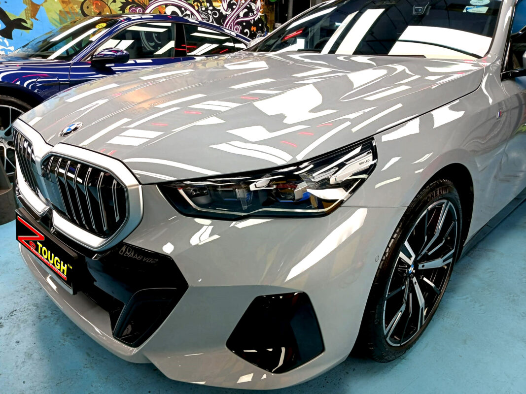 The BMW 5 Series from a side angle after the titanium coating.