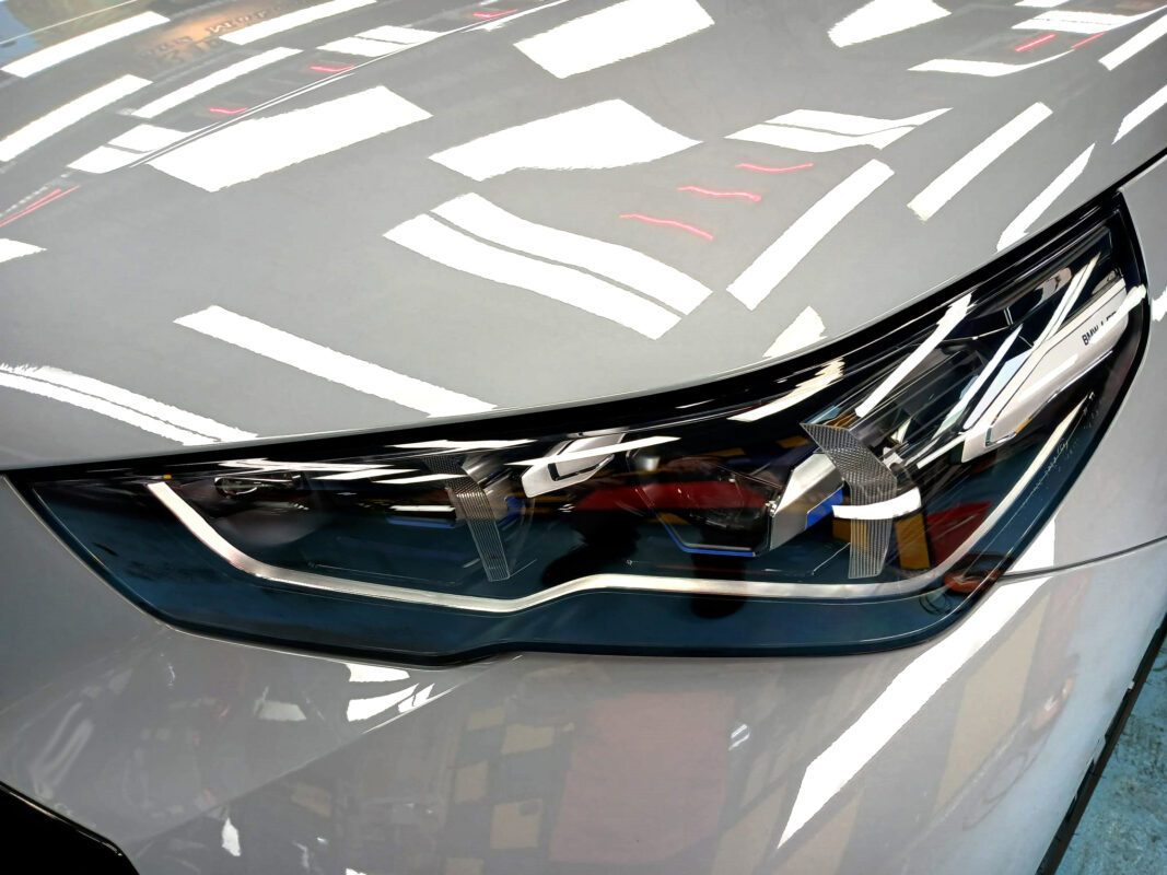 The 5 Series' coated paintwork showing clean reflections.