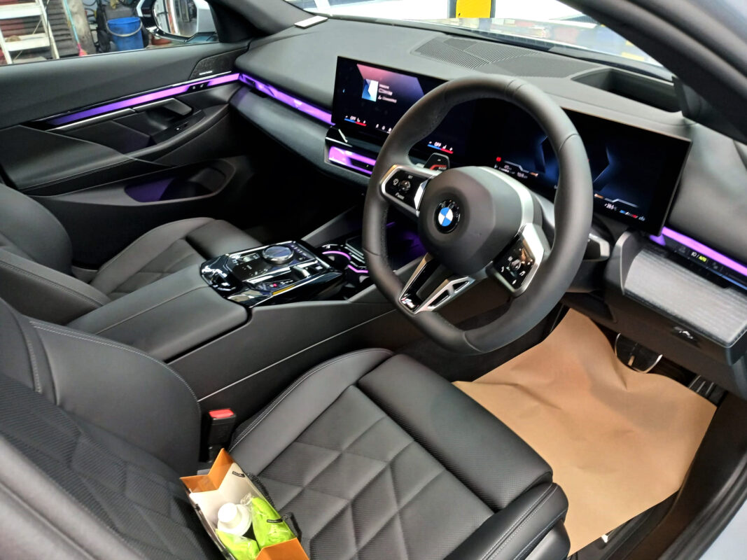 Front three-quarter view of the BMW 5 Series after coating.