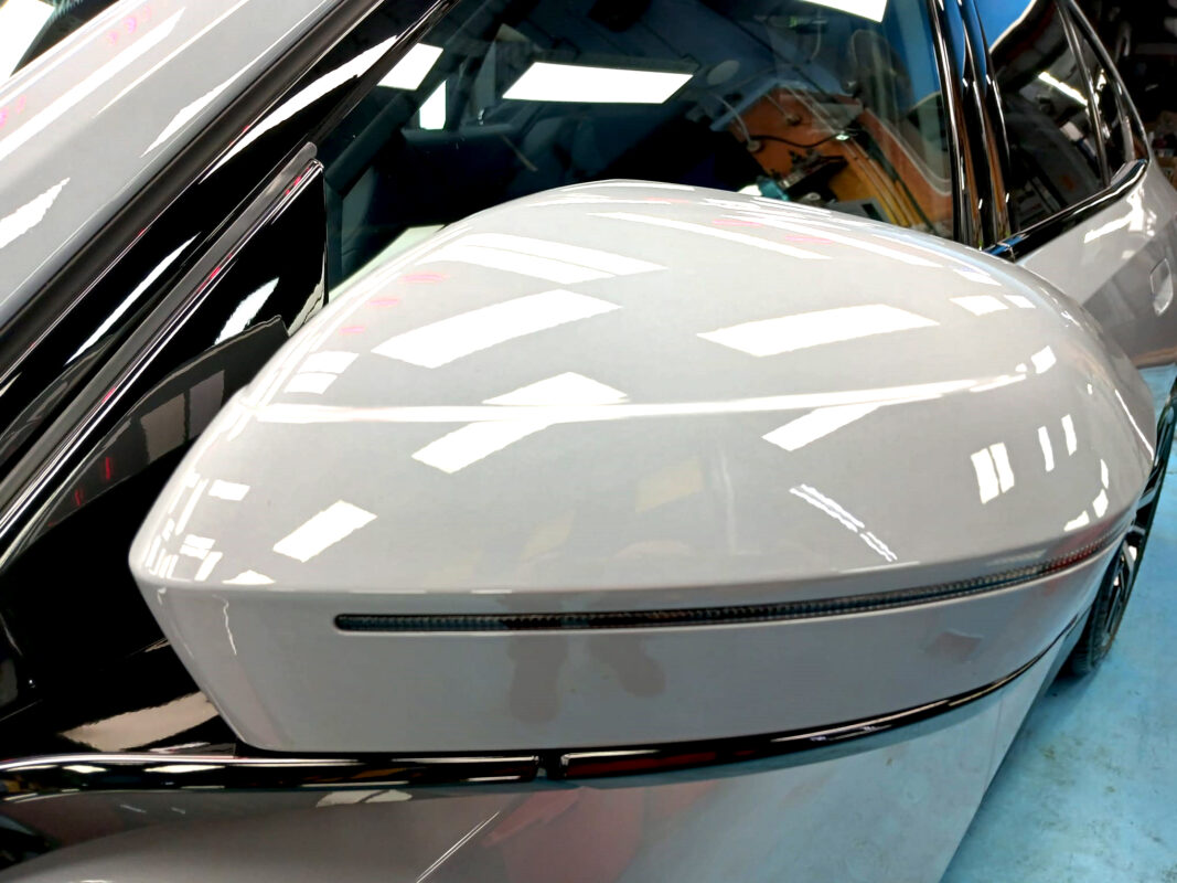 Side panel of the BMW 5 Series with the titanium finish locked in.
