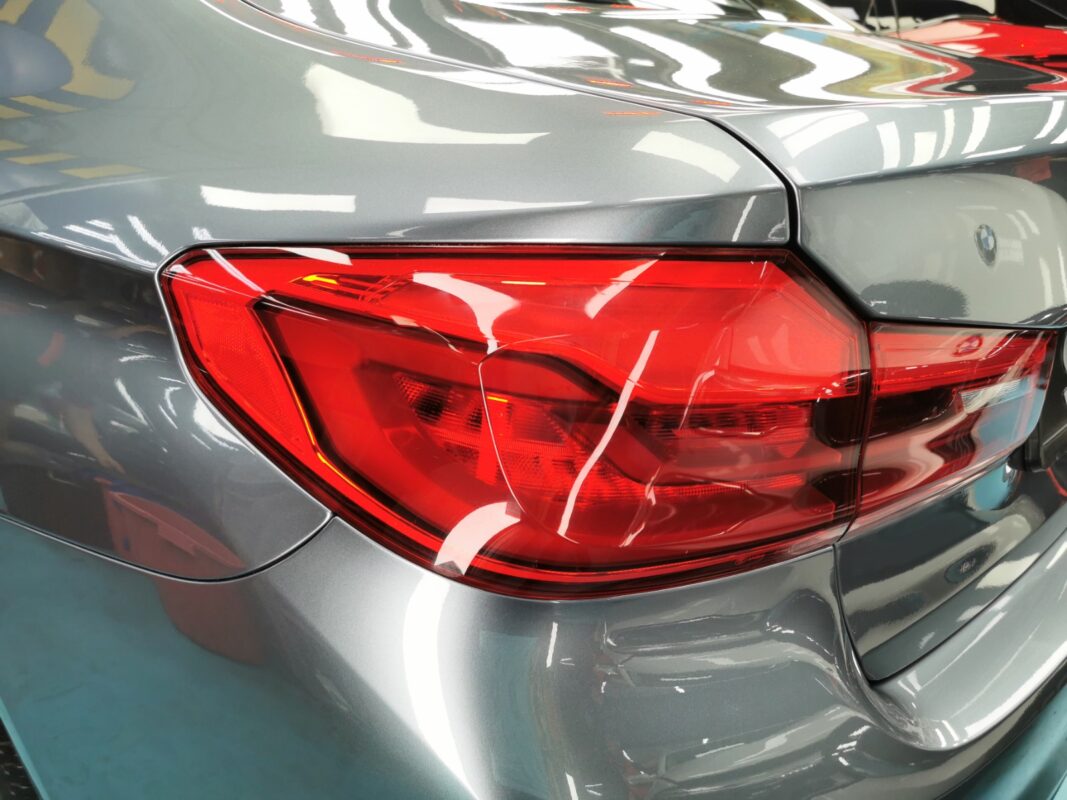 After: the BMW 5 Series fully resprayed and sealed with ZeTough Ceramic Paint Protection.