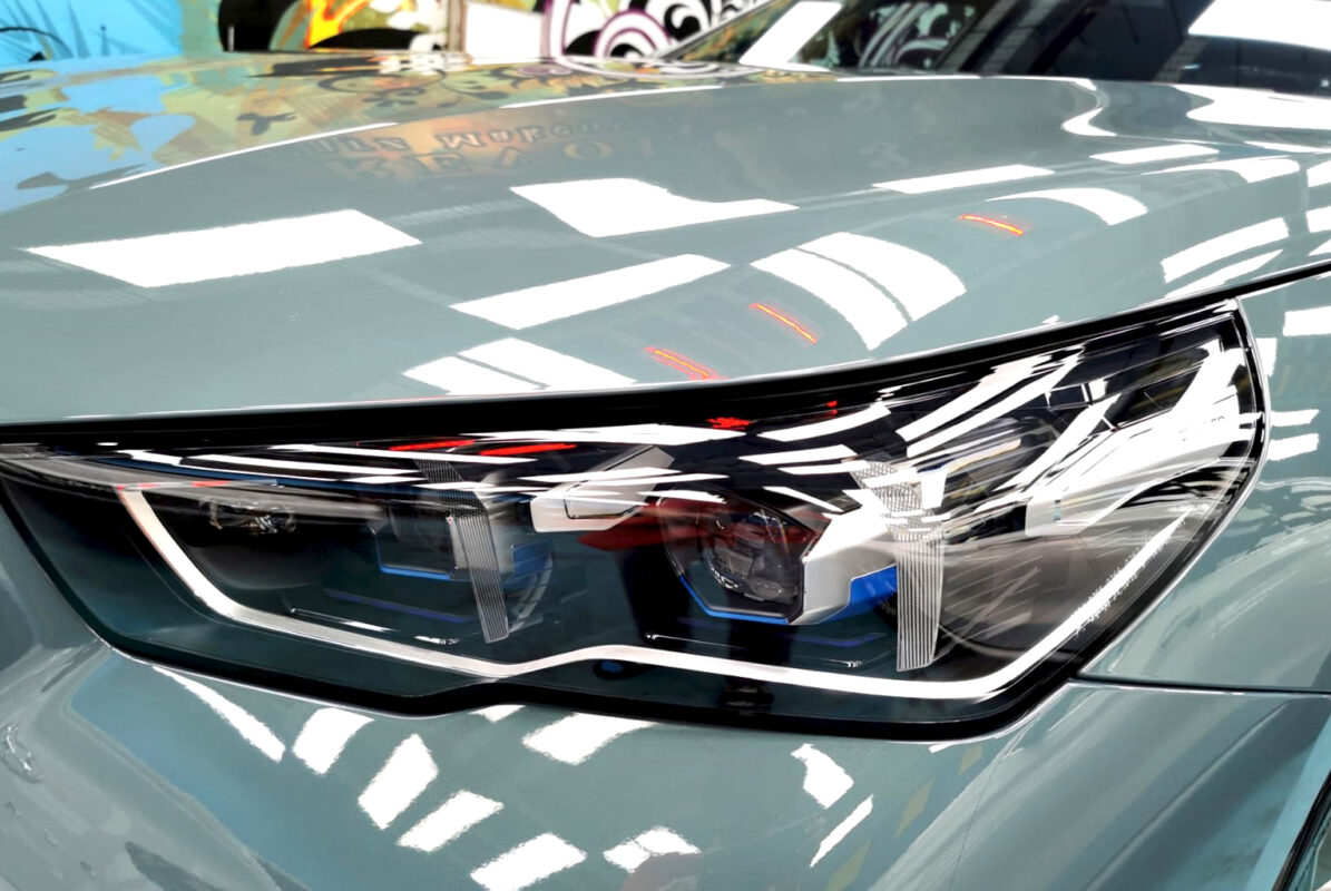 The 5 Series' coated paintwork showing clean reflections.