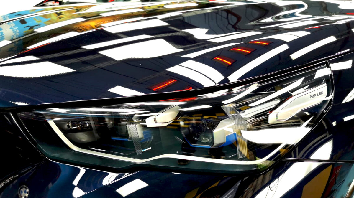 The 5 Series' coated paintwork showing clean reflections.