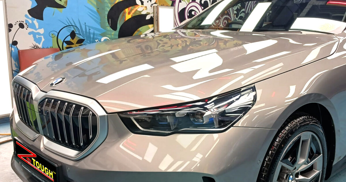 The BMW 5 Series from a side angle after the titanium coating.