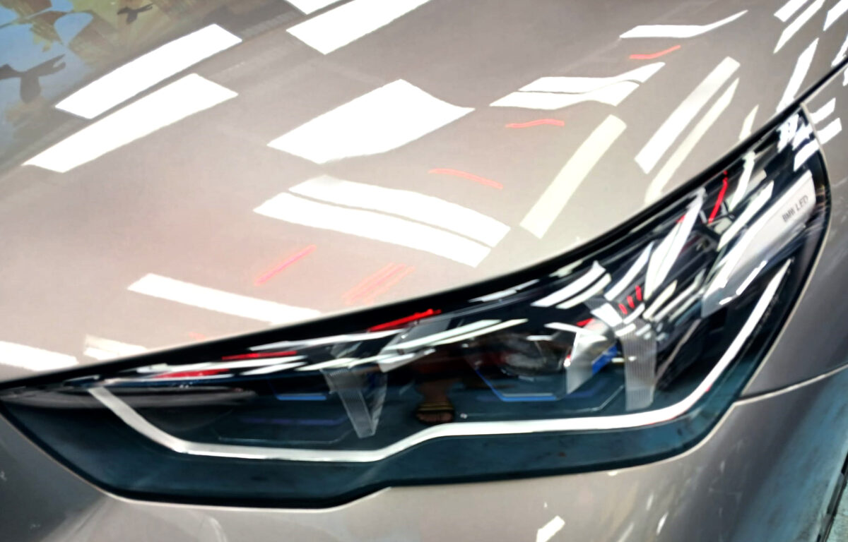 The 5 Series' coated paintwork showing clean reflections.