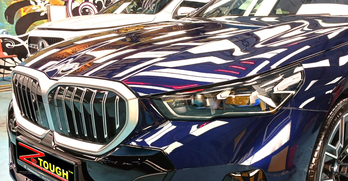 The BMW 5 Series from a side angle after the ceramic coating.
