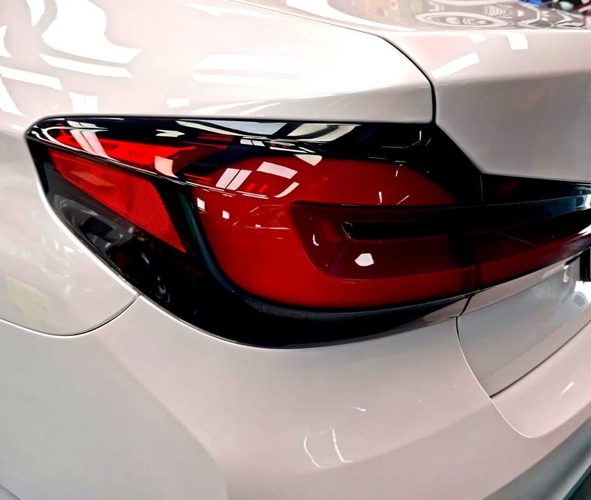 Close-up of the 5 Series tail light on white paint.