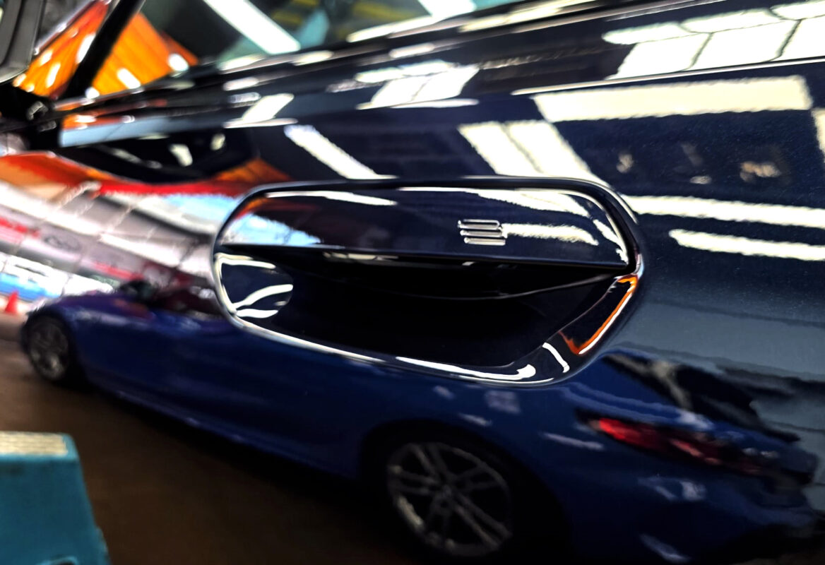 The coated paintwork of the BMW 5 Series, clean and sharp.
