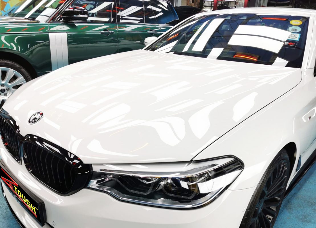 The BMW 520d from a side angle after the ceramic coating.