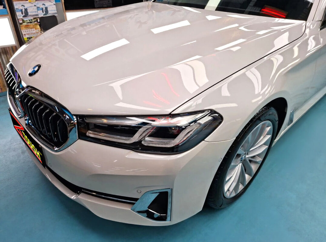 The BMW 520i from a side angle after the ceramic coating.