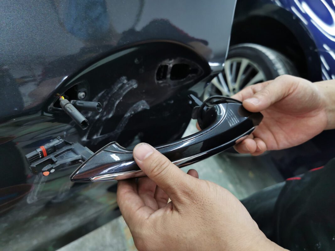 Panels exposed during disassembly of the BMW 520i, ready for bodywork.