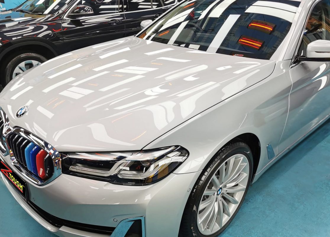 The BMW 520i from a side angle after the ceramic coating.