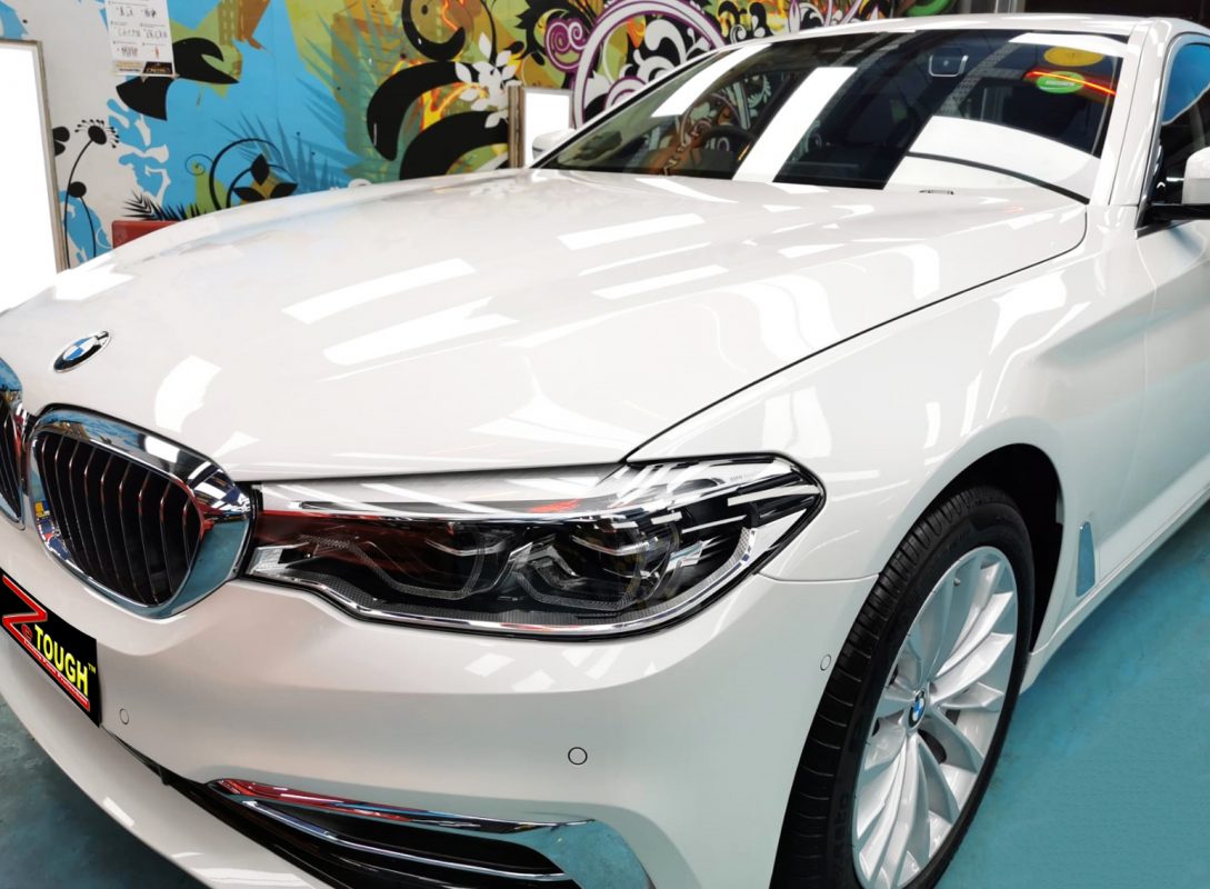 The BMW 520i from a side angle after the ceramic coating.