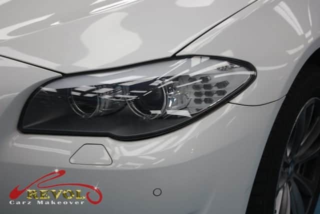The BMW 520i from a side angle after the ceramic coating.