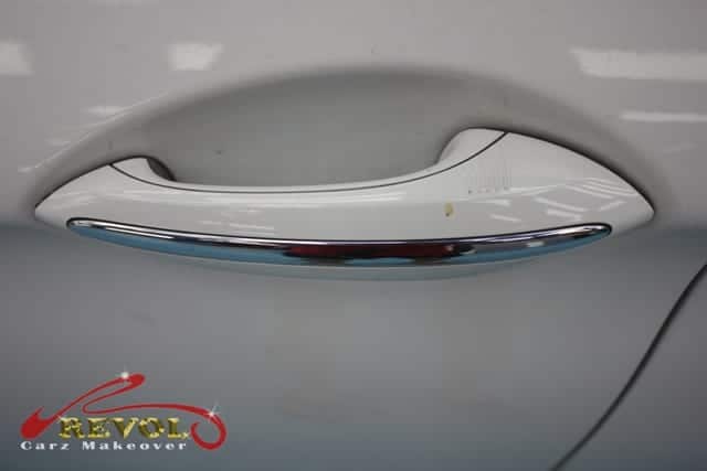 Rear quarter of the BMW 520i, glossy and protected.